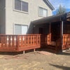 Photo 9:  Newly refinished wrap around deck