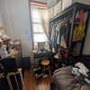 Photo 4: Front room. Dresser and, AC, and wardrobe available.