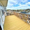 Photo 2: Front porch view