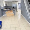 Photo 9: Kitchen and living area