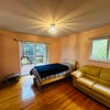 Photo 6: Room has furniture