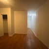 Photo 4: Private living room closet & hallway