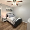 Photo 2: Furnished Bedroom + TV