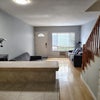Photo 5: Lower floor. View from kitchen, living room, to front door.