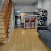 Photo 3: Lower floor.  View into kitchen.