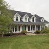Photo 2: Front view of the house