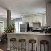 Photo 1: Upgraded kitchen with breakfast bar
