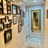 Photo 5: Hallway to common areas
