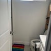 Photo 6: Bathroom you'll be sharing from entrance