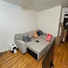 Photo 1: Partial of living room with couch