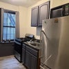 Photo 7: Fully stocked kitchen with appliances. 