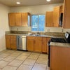 Photo 4: Washing machine and gas stove