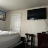 Photo 3: FLAT SCREEN TV AND MINI FRIDGE INCLUDED