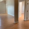 Photo 5: Shared living space and bedroom doors