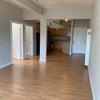 Photo 8: Shared living space and kitchen