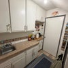 Photo 7: Some cabinet space available, utilty sink and coffee and tea setup