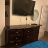 Photo 5: Big 9 drawer dresser! 40” tv and recently added lots of channel and movie apps available. 