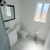 Photo 2: Private Bathroom with Shower