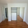 Photo 3: Large Closet + Linen Closet by bathroom