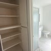 Photo 4: Linen closet