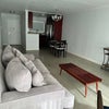 Photo 3: Shared living room and kitchen