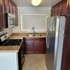 Photo 4: Shared kitchen with refrigerator, stove and microwave