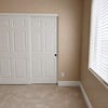 Photo 2: Bedroom and closet area
