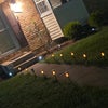 Photo 2: Front of the house at night