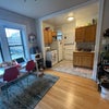 Photo 2: Kitchen/dining room with back door access through alley. 