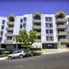 Photo 8: Outside View of the Apartment Building