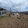 Photo 9: Large backyard with firepit 