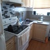 Photo 4: Shared kitchen with access to back stairs and laundry
