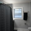 Photo 8: Upstairs restroom 