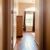 Photo 2: Hallway to bedroom