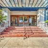 Photo 7: Building entrance 