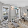 Photo 2: Living area offers perfect work from home nook