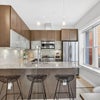 Photo 3: Updated kitchen with quartz countertops