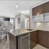 Photo 4: Stainless steel appliances and plentiful cabinet storage