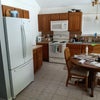 Photo 7: Kitchen with 35 cu ft refrigerator/freezer 