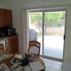 Photo 8: kitchen Looking out patio boors