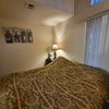 Photo 3: Private Bedroom with Glass Doors Leading to Private Balcony