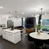 Photo 3: Kitchen, Dining, and Shared Living Space