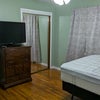 Photo 2: Room in its current state after renovation.
