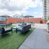 Photo 3: Rooftop with gas bbq grills