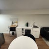 Photo 3: Kitchen with fridge, microwave, sink, etc. Grill and full kitchen accessible on limited basis.