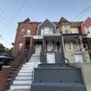 Photo 2: Separate entrance in front and back of house