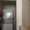 Photo 7: Laundry room next to stairs
