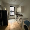 Photo 6: Washer and Dryer in unit 