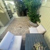 Photo 6: Cozy quiet payio with fire pit, and propant bbq for your use