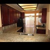 Photo 6: Big kitchen. You have half the cabinets and drawers and your own refrigerator!